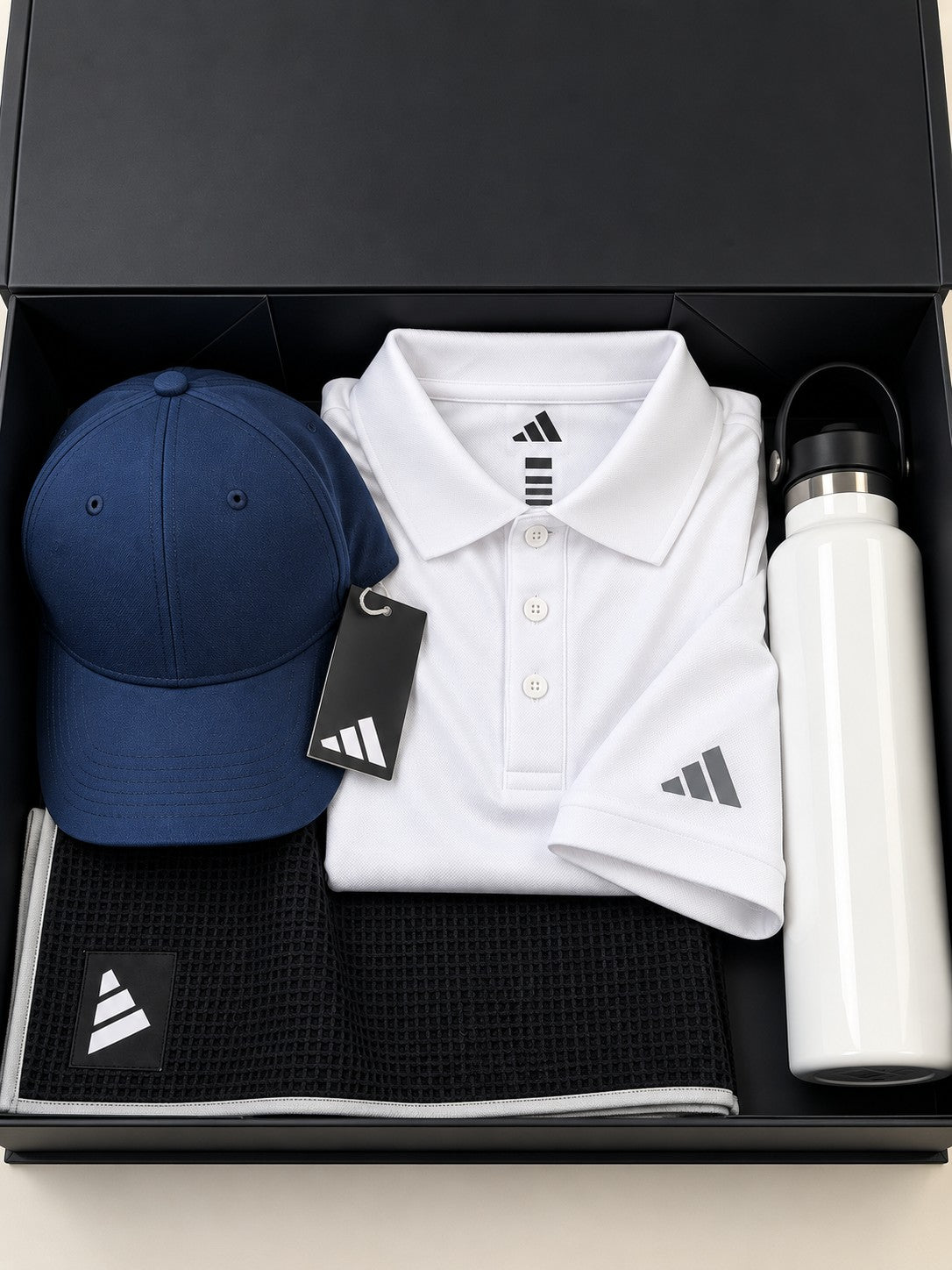 Personalised adidas golf gift box with polo, cap, towel and bottle