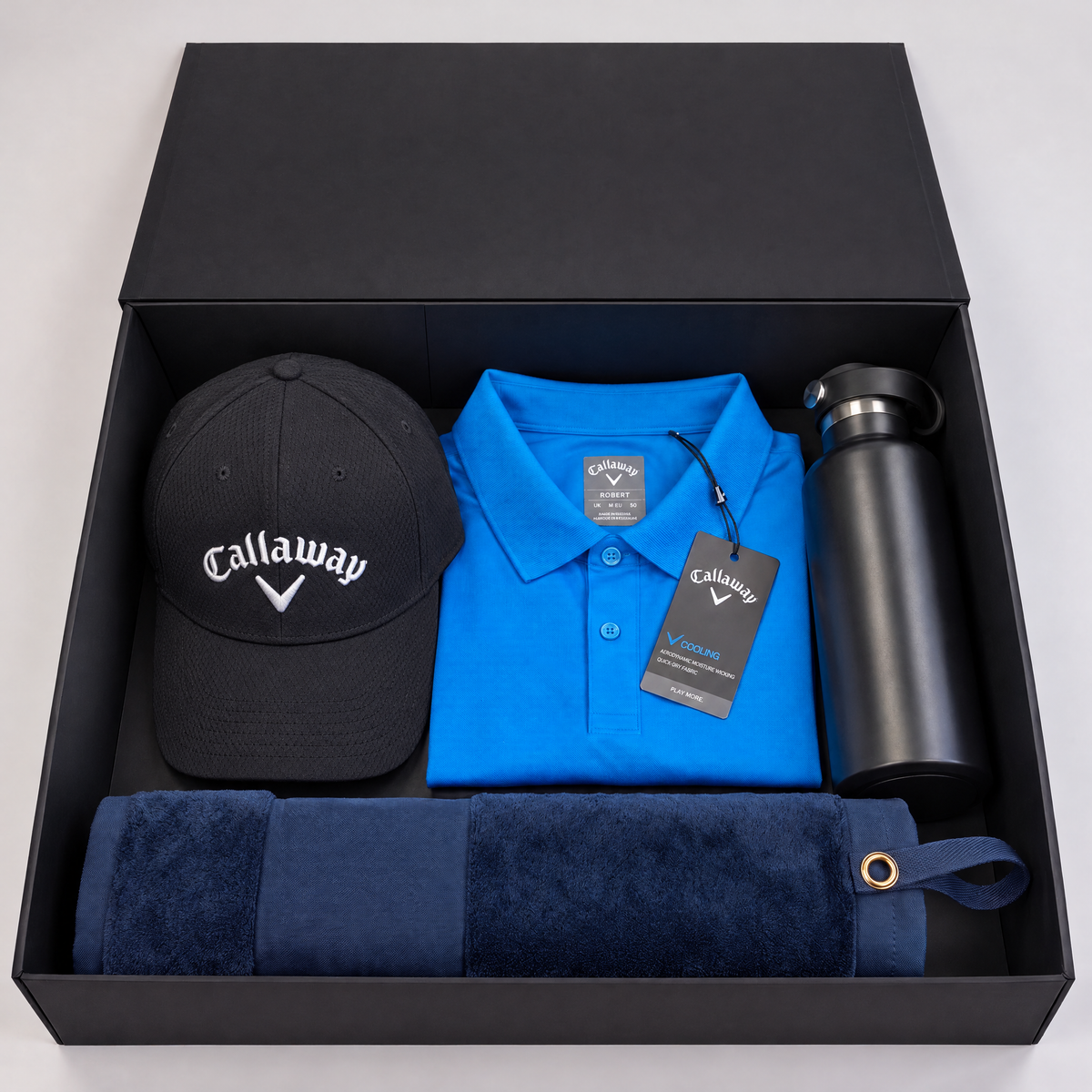 Personalised Callaway golf gift box with polo, black Callaway golf cap, navy velour towel and bottle