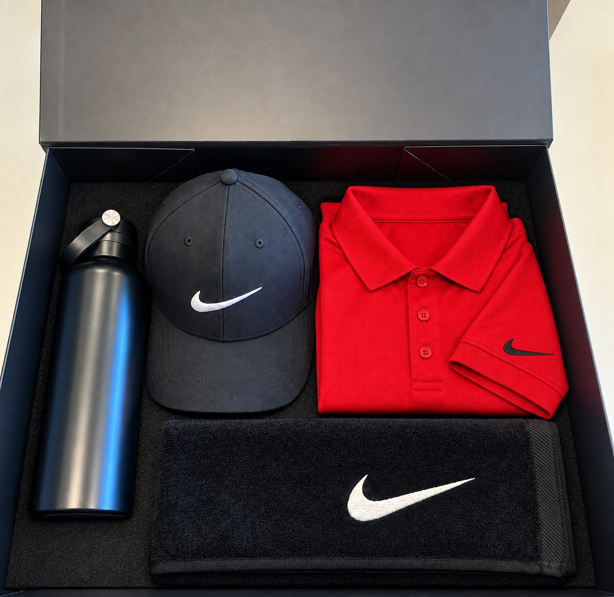Personalised Nike golf gift box with polo, cap, towel and bottle